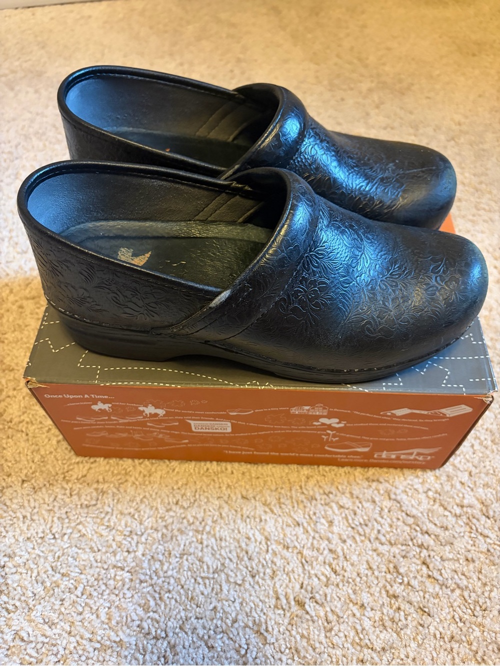 Dansko Black Embossed Leather Slip-On Clogs - Picture 2 of 4